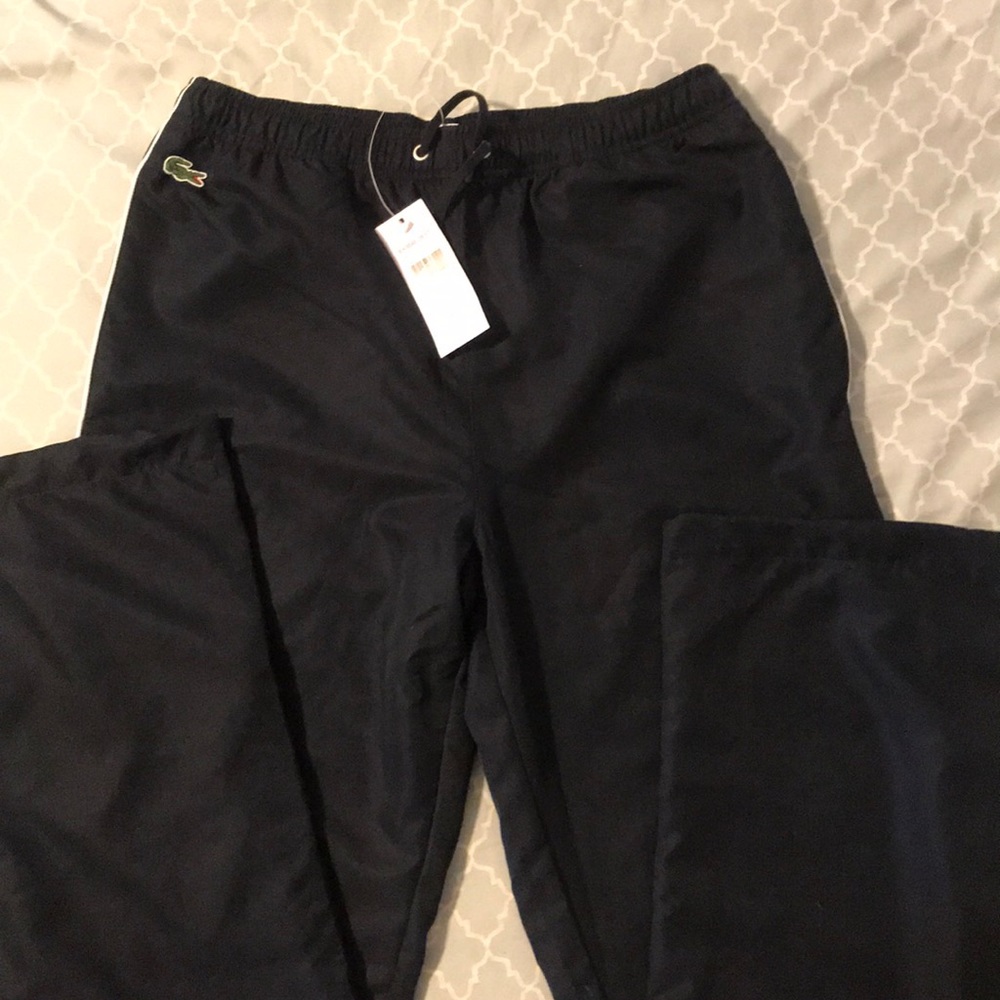 Men’s Navy Lacoste Sport Pants - size Small…